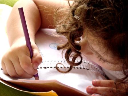 photo of child writing